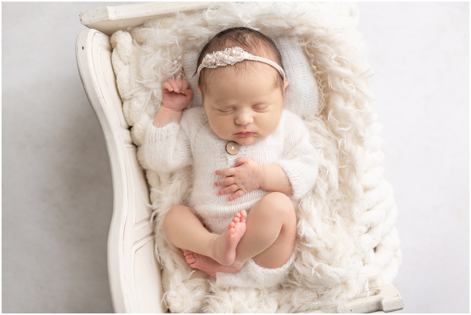 Relaxed natural pose ideas for baby girl in all white Columbus Ohio